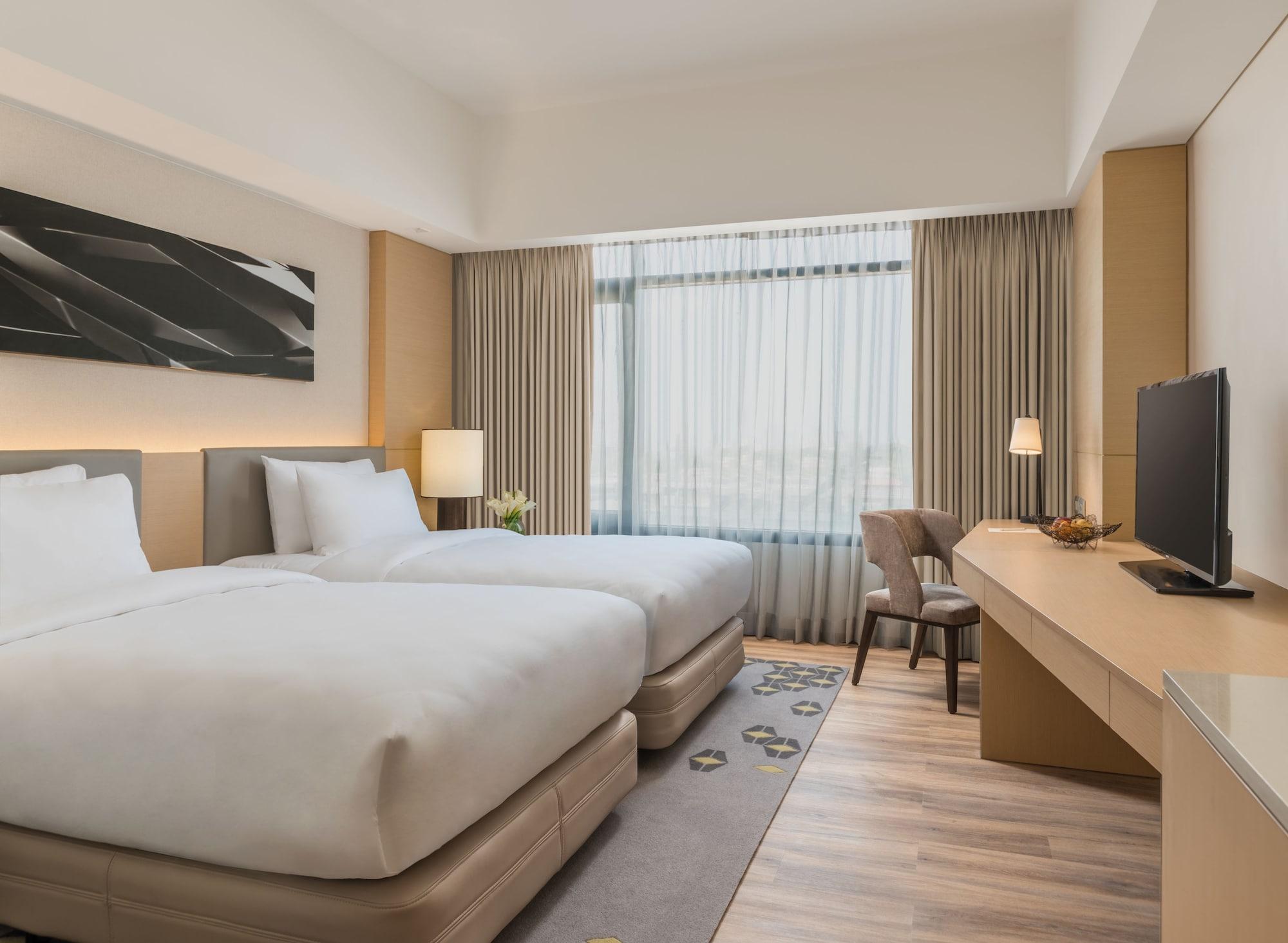 Seda Vertis North Quezon City Bagian luar foto Deluxe Room
