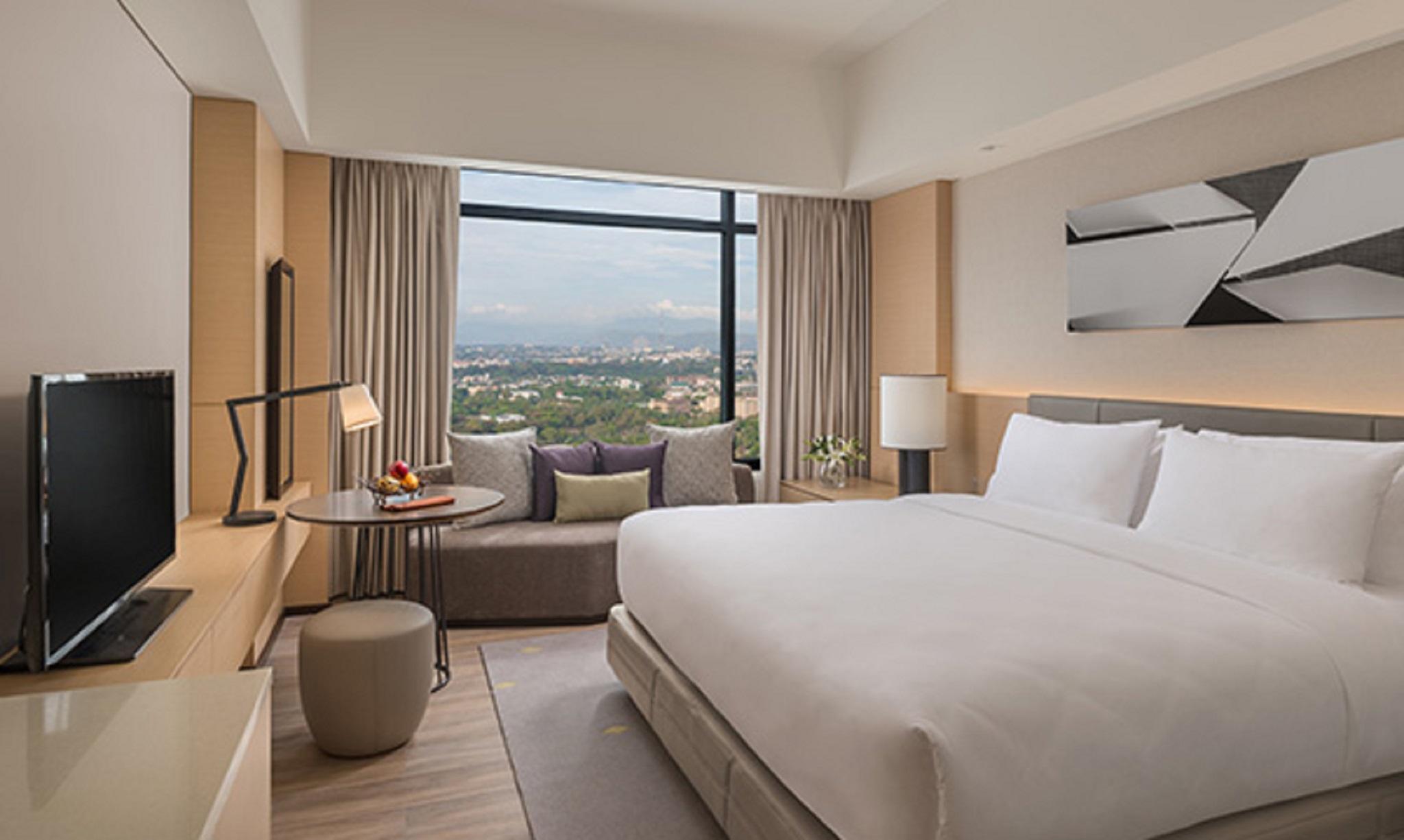 Seda Vertis North Quezon City Bagian luar foto Deluxe Room