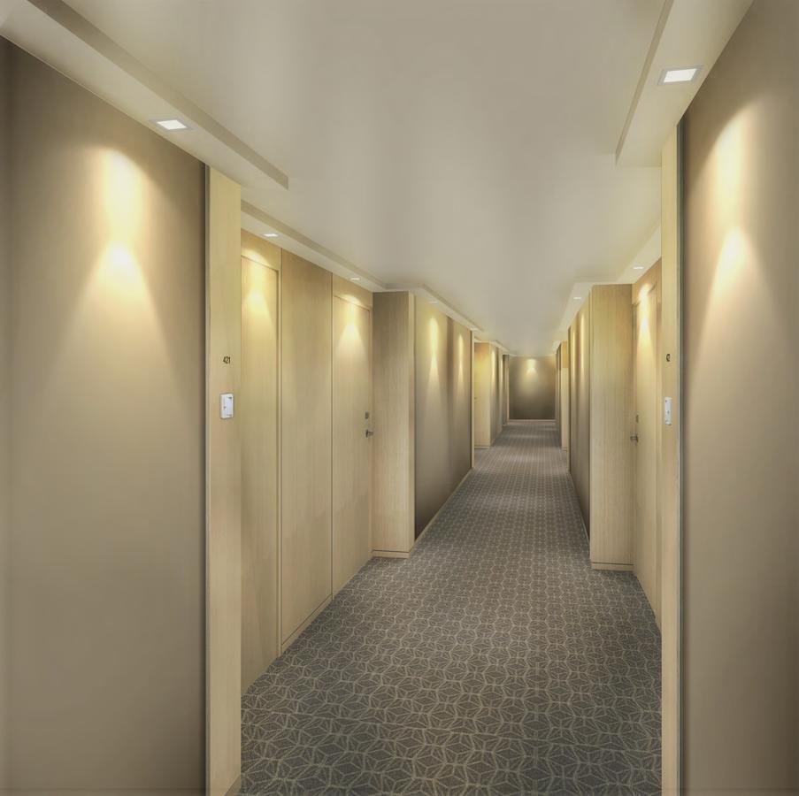 Seda Vertis North Quezon City Bagian luar foto A typical hotel corridor
