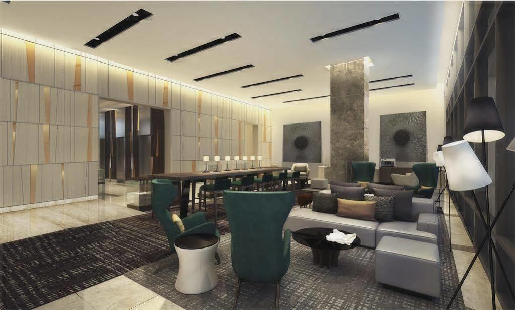 Seda Vertis North Quezon City Bagian luar foto The lobby of the hotel