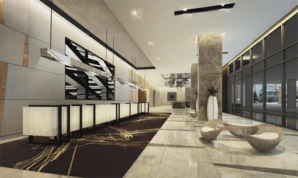 Seda Vertis North Quezon City Bagian luar foto The lobby of the hotel