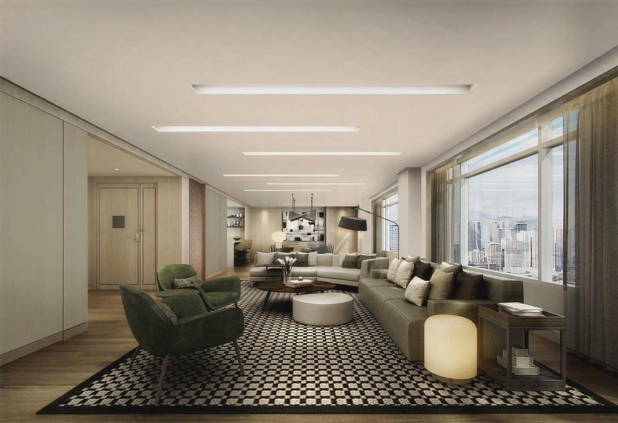 Seda Vertis North Quezon City Bagian luar foto The living room of a three-bedroom apartment